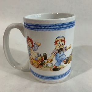Raggedy Ann and Andy coffee cup